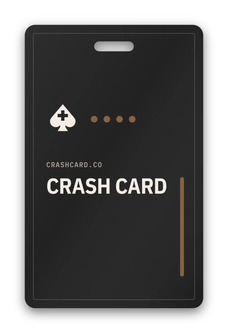 The blank Crash Card badge front: the bone spade mark, four index dots, the crashcard.co handle, and the CRASH CARD wordmark.
